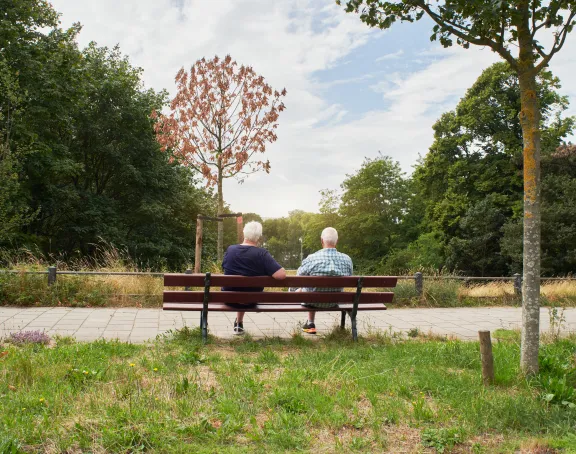 Older people sitting on a bench