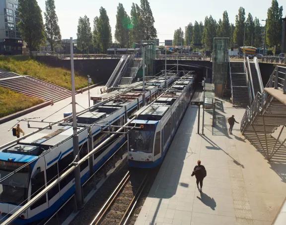 Two trams at a tram station