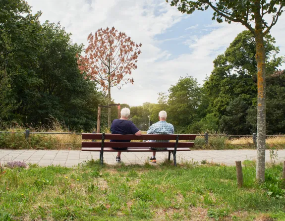 Older people sitting on a bench