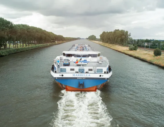 Shipping boat on a river